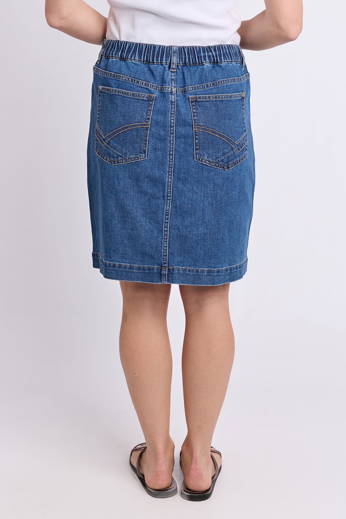 Elm Birdie Denim Skirt in Mid Blue Wash, side view