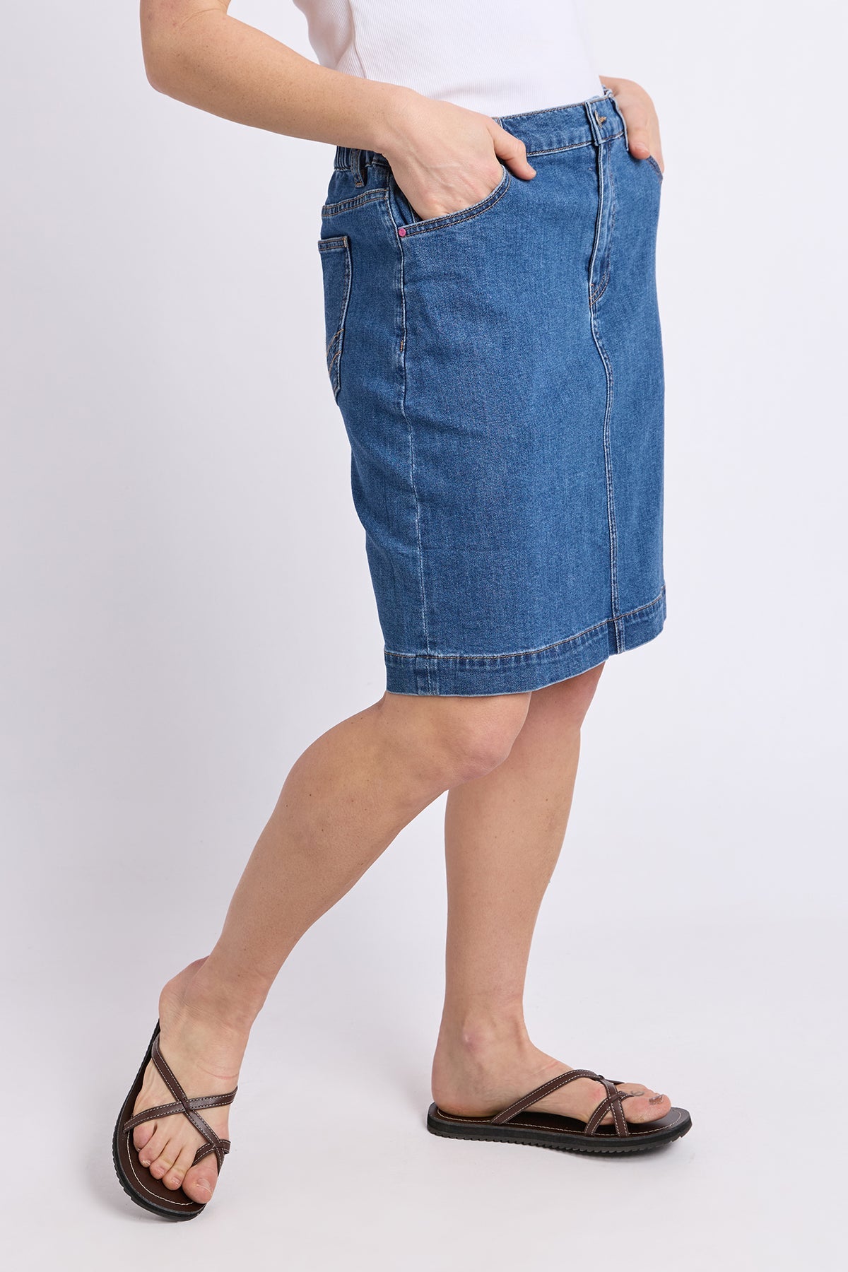 Elm Birdie Denim Skirt in Mid Blue Wash, back view