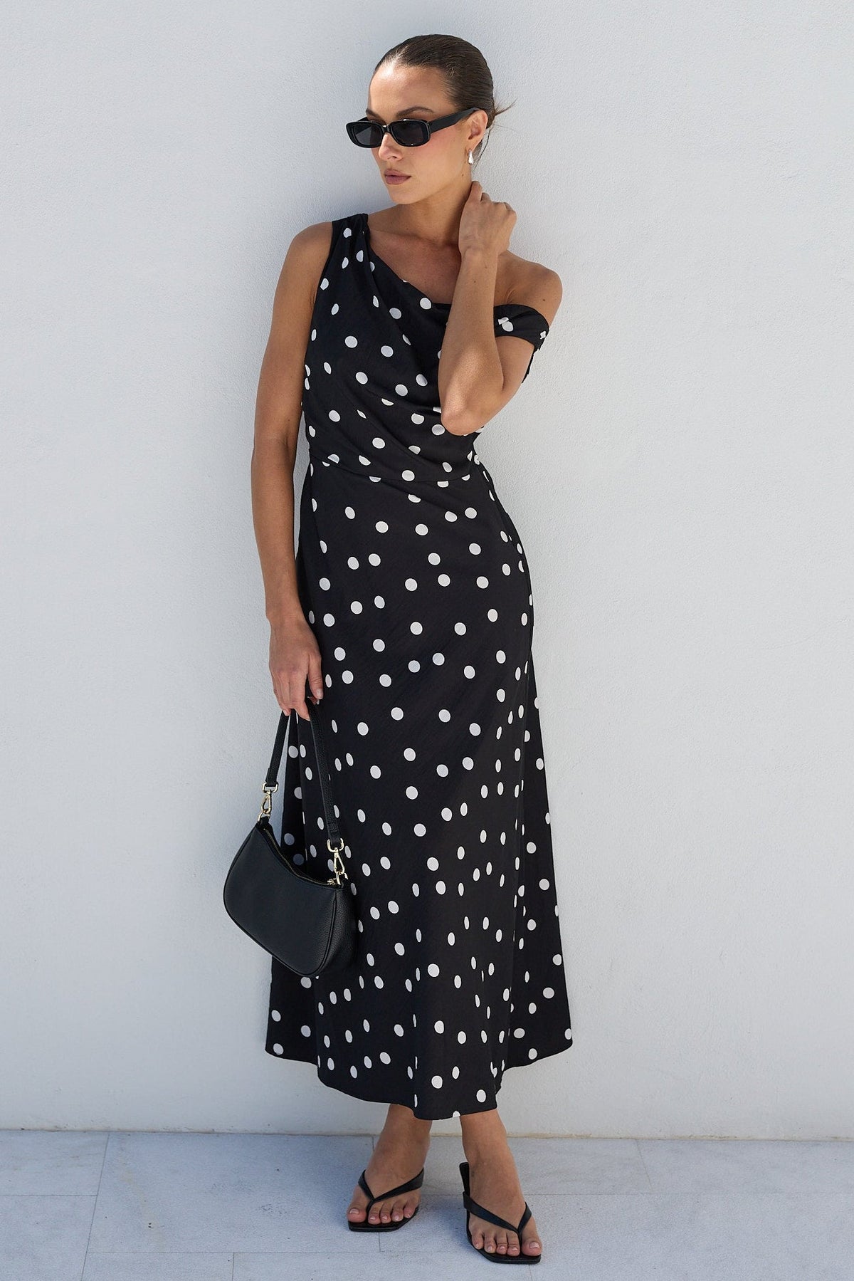 Stories to be Told Spotlight Black Polka Dot Off Shoulder Flare Midi Dress, front view