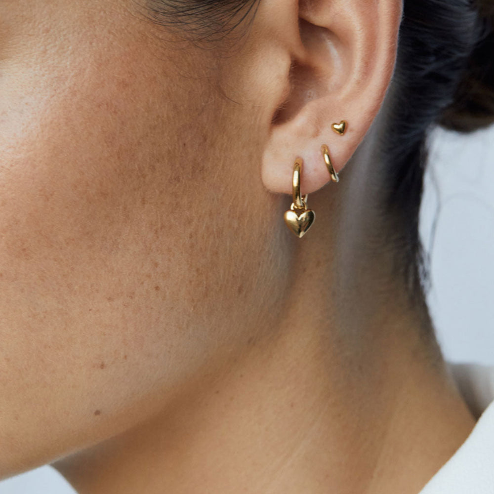 amore-stud-earrings-gold-campaign-linda-tahija-LR.jpg