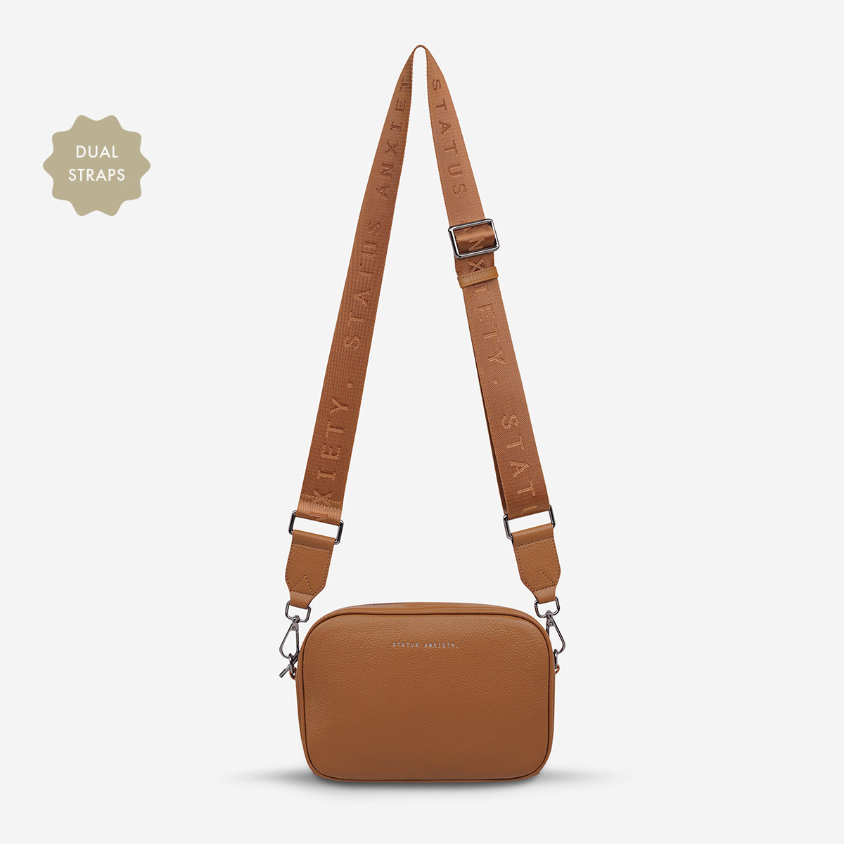 Status Anxiety Plunder Bag in Camel with web strap, front view