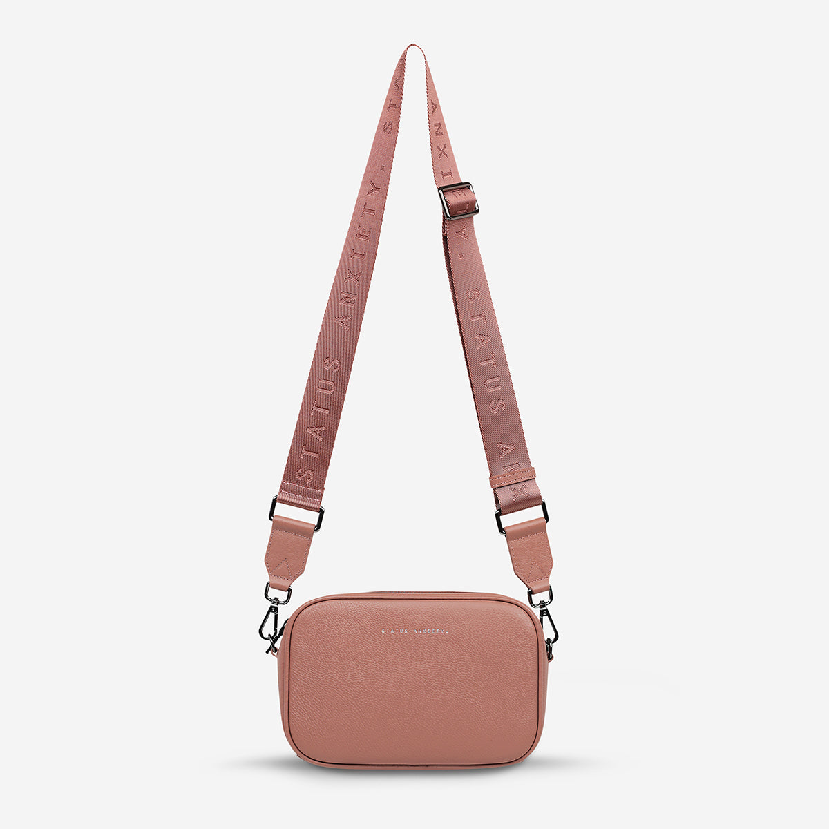 status-anxiety-bag-plunder-webbed-strap-dusty-rose-front-hanging.jpg