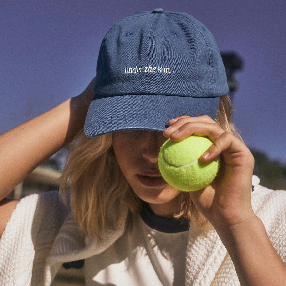 status-anxiety-hat-under-the-sun-logo-french-blue-6-lifestyle-img.webp