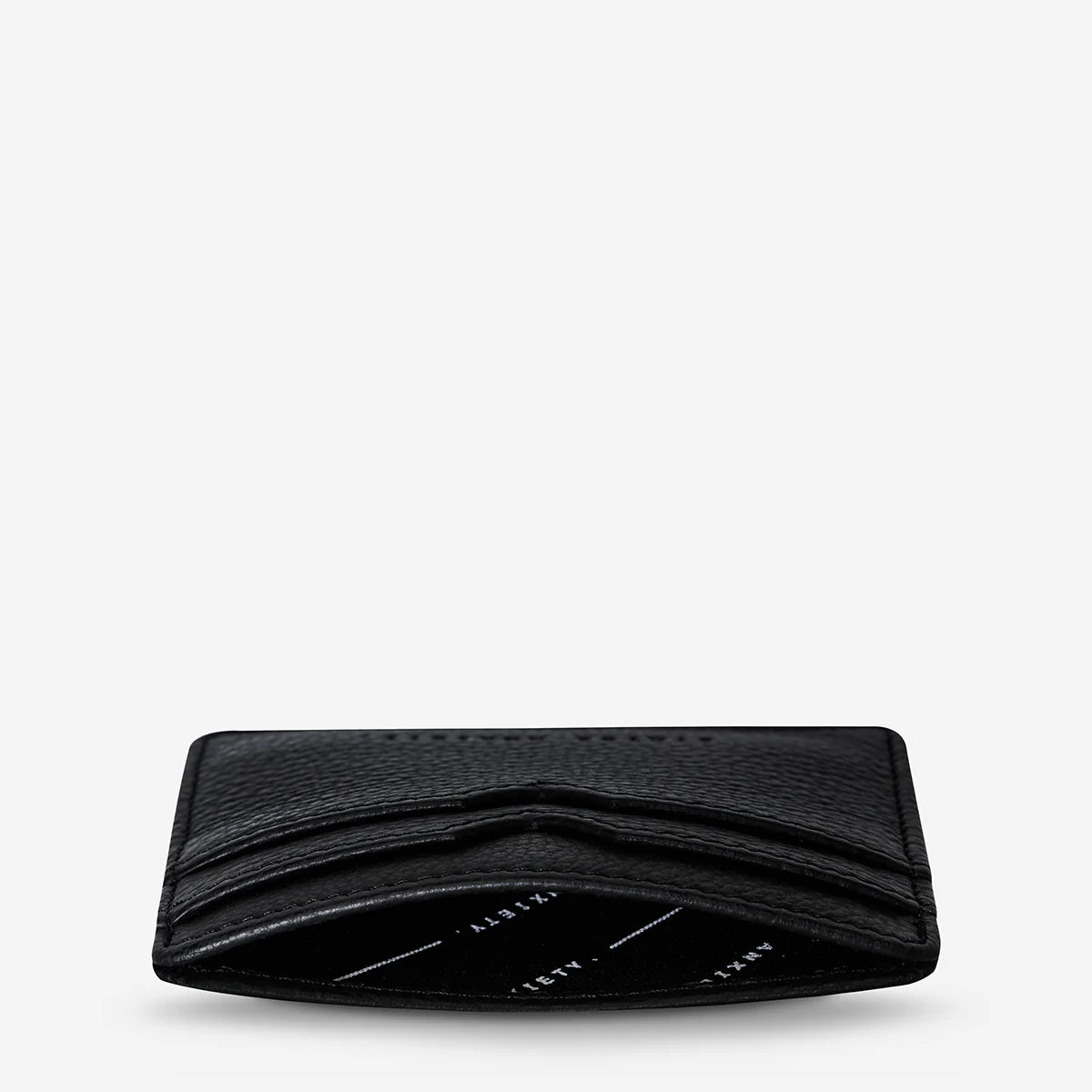 status-anxiety-wallet-together-for-now-black-top-angle.webp